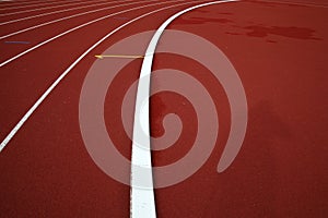 Curve on a red running track