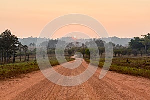 Curve road in the valley with sunrise and mist