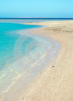 Curve sand beach with surf water background