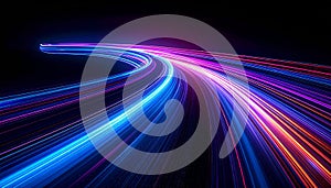 Curved Blue and Pink Light Trails on a Dark Background Representing Speed abstract motion blur