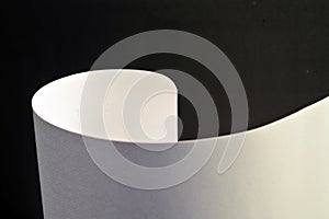 Curved corner of a paper page, isolated