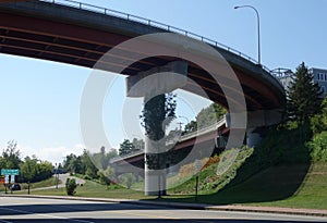 Curved highway overpass, inclined, view from underneath