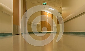 Curved hospital corridor at night