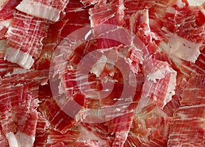 Curved Iberic ham. Spanish tapas