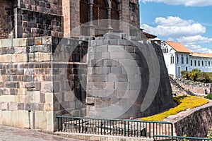 Curved Inca stone wall at Qorikancha, Cusco, Peru photo