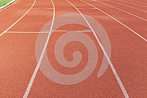 Curved lane in running track or athlete track in stadium. Running track is a rubberized artificial running surface for track and f