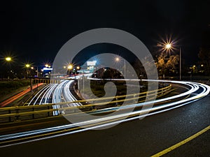 Curved Light Trails at Night Time