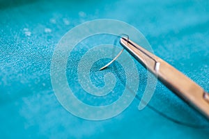 Curved needle