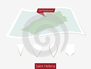 Curved paper map of Saint Helena with capital Jamestown on Gray