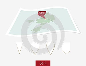 Curved paper map of Sark with capital on Gray Background. Four d