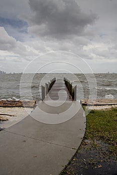 Curved Path to Pier Stormy Afternoon - Vertical