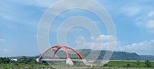 curved red bridge