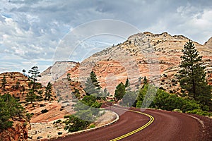 Curved Red Rock Asphalt Road Running Through The Landscape Of Sa