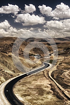 Curved road with amazing sky