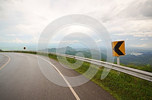 Curved road with mountain views