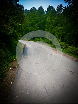 Curved road between mountains
