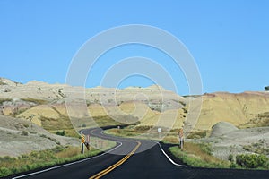 Curved Roads of Badlands National Park on a Clear Day