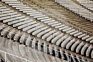 Curved rows of seats in stadium