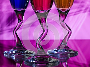 Curved stems of wine glasses