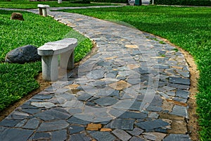 Curved stone walkway in the garden