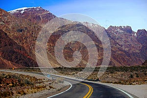 Curved tracks skirting the Andes mountains