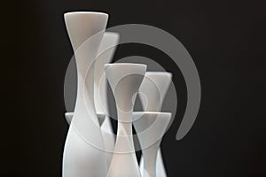 curves of empty vases in black and white