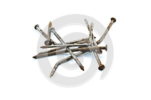 Curves of rusty nails on white background