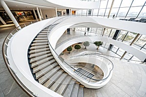 Curvilinear stairs in modern architecture photo