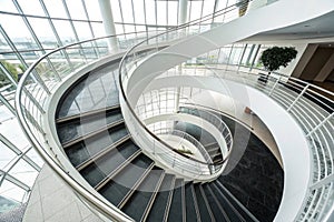Curvilinear stairs in modern architecture photo