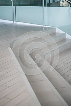 Curvilinear stairs. Top view of modern architecture detail. Refined fragment of contemporary office interior, public photo