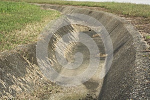 Concrete drainage ditch photo