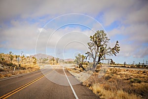 A curving highway through a desert