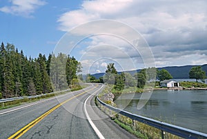 Curving lakeside road,