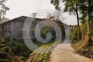 Curving path in deserted 1970s` factory