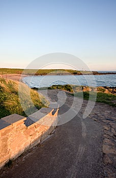 Curving path leading to a bay