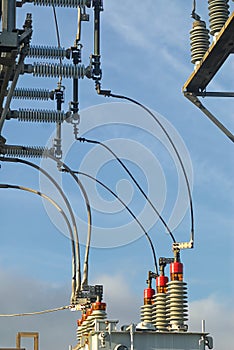 Curving power lines from transmission to distribution in a sub station.