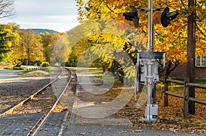 Curving Railway Track and Colourful Autumn Trees