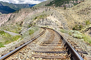 Curving Railway Track in a Mountain Landscape