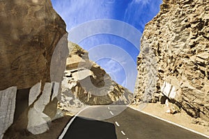 Curving road through cliffs and mountains between Ajmer and Push