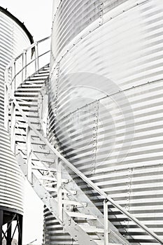 Curving steel staircase on a grain bin