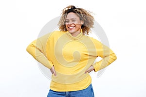 Curvy african american woman smiling against isolated white background