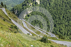 Curvy mountain pass road to the Timmelsjoch at the border of Italy and Austria in the Alps
