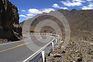 Curvy mountain road inperuvian andes mountain