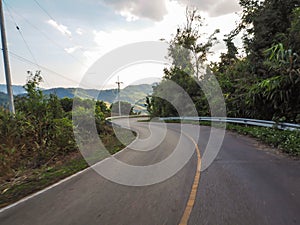 CURVY ROAD IN MOUNTAIN