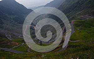 Curvy road in mountains, traffic lights