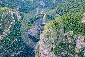 Curvy road through rocky mountains