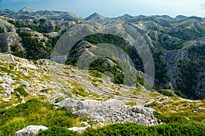 Curvy road to mountain peak Sveti Jure, Biokovo, Dalmatia, Croat