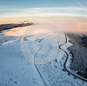 Curvy road in winter mountain