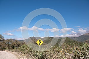 Curvy signpost on the Los Lagos trails in the Potrero de Yala Provincial Park in Jujuy, Argentina