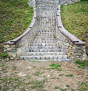 Curvy stone and concrete stairs